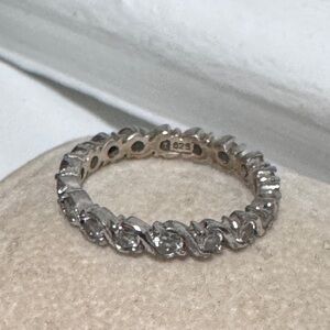 💎 Sparkling .925 Sterling Silver Eternity Ring — Twisted Elegance! 💎